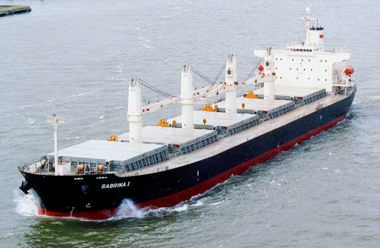 Geared bulk carrier at sea, photographed from above